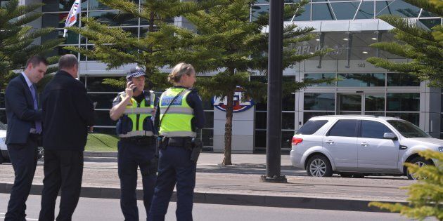 Police were shepherding people away from AFL House in Melbourne on Thursday afternoon.