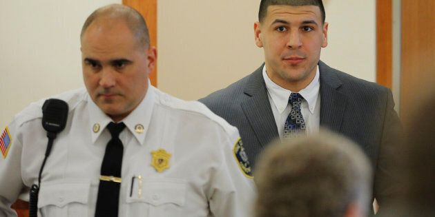 Former New England Patriots football player Aaron Hernandez arrives in the courtroom at Bristol County Superior Court in Fall River, Massachusetts, on April 1, 2015.