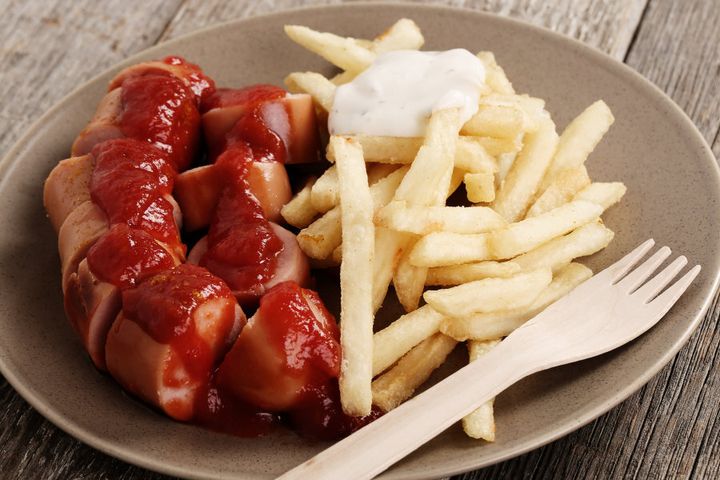 Germany's famous curry wurst with pommes frites (French fries) definitely hits the spot.