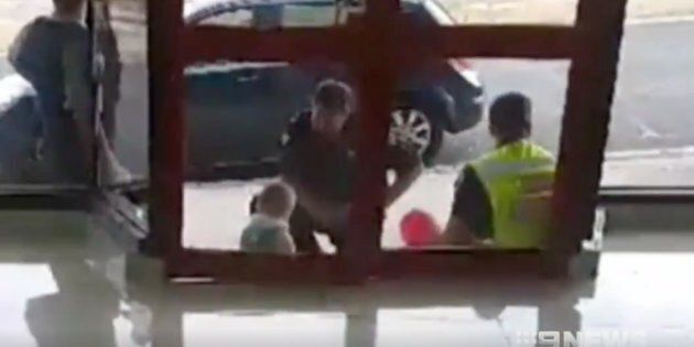 Police comforted the child after rescuing him.