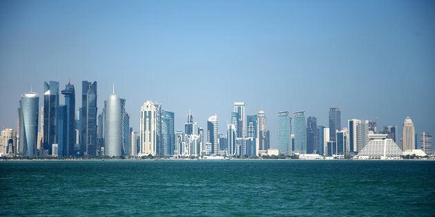 DOHA, QATAR - DECEMBER 29: The West Bay skyline of Doha, Qatar's capital city, as seen from the Corniche ahead of the 2022 FIFA World Cup Qatar on December 29, 2015 in Doha, Qatar. (Photo by Warren Little/Getty Images)