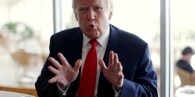 Republican U.S. presidential nominee Donald Trump sits for an interview at Trump National Doral golf club in Miami, Florida, U.S. October 25, 2016. REUTERS/Jonathan Ernst