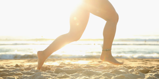 running in sand barefoot