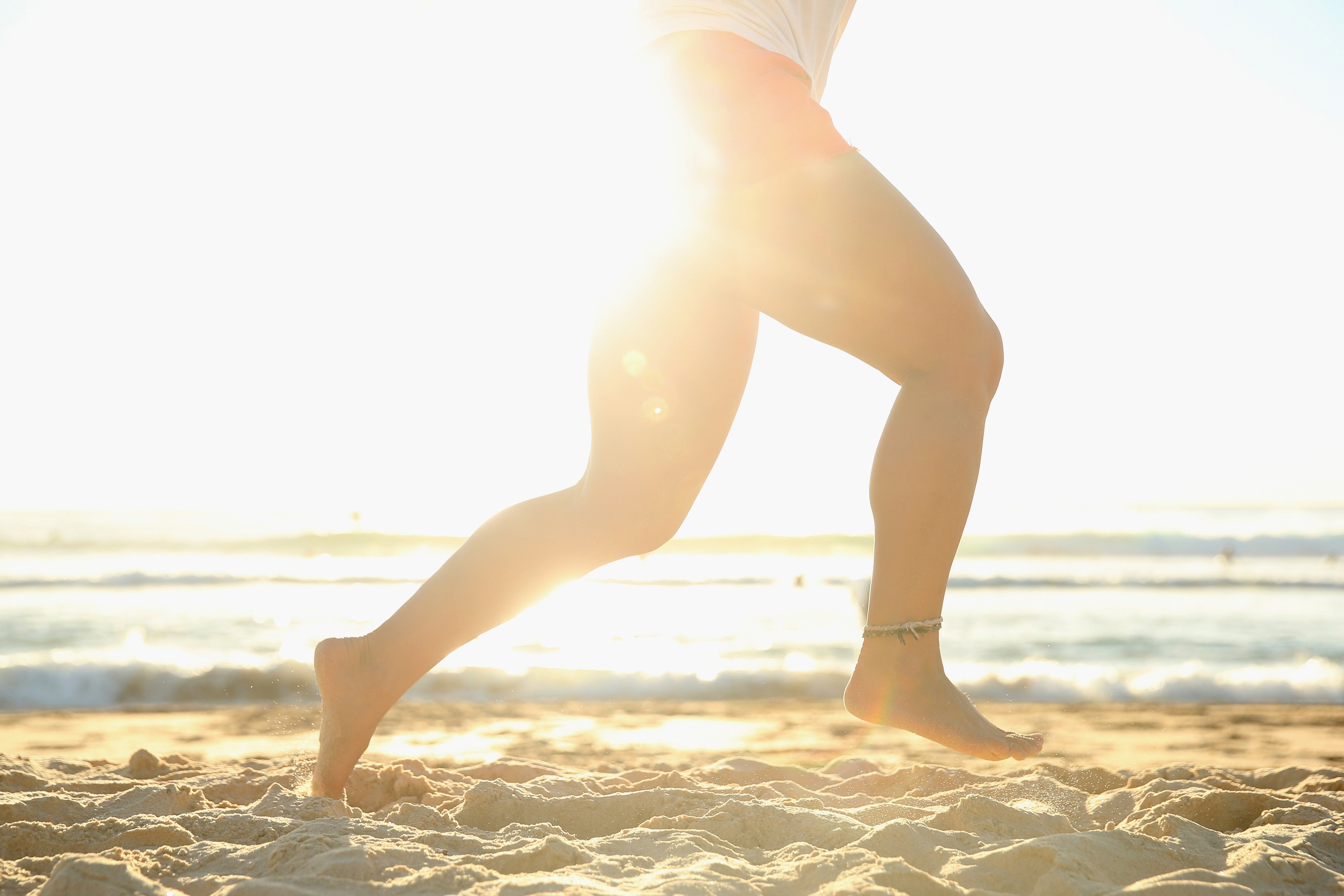 running in sand barefoot