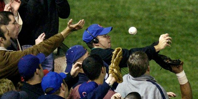That's Bartman with the blue cap.