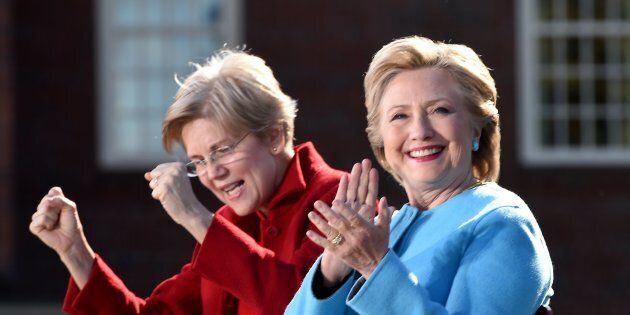 US Democratic presidential candidate Hillary Clinton (R) and Sen. Elizabeth Warren attend a campaign rally October 24, 2016 at Saint Anselm College in Manchester, New Hampshire. / AFP / Robyn BECK (Photo credit should read ROBYN BECK/AFP/Getty Images)