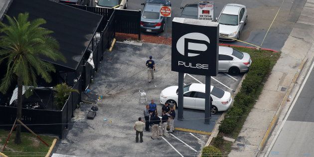Investigators work the scene following a mass shooting at Pulse, a gay nightclub in Orlando, Florida, on June 12. ISIS claimed responsibility for the attack, but didn't direct it.