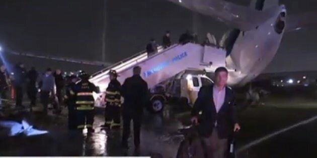 The plane that was carrying Republican vice presidential nominee Mike Pence sits on the runway at New York's LaGuardia Airport October 27, 2016 in New York.Republican vice presidential candidate Mike Pence's campaign plane slid off a runway after landing at New York's LaGuardia Airport in the evening, the campaign said. No injuries were reported. / AFP / Don EMMERT (Photo credit should read DON EMMERT/AFP/Getty Images)