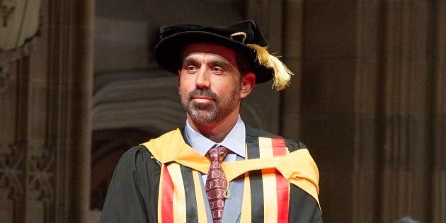 Adam Goodes accepts his honorary doctorate on Thursday