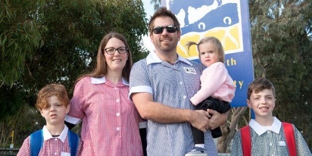 A family of Craigburn State School wearing dresses for Do It In A Dress Day.