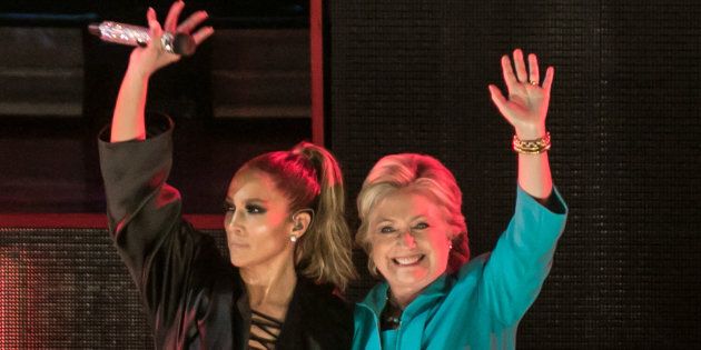 MIAMI, FL - OCTOBER 29: Jennifer Lopez and Hillary Clinton are seen at the Jennifer Lopez Gets Loud for Hillary Clinton at GOTV Concert in Miami at Bayfront Park Amphitheatre on October 29, 2016 in Miami, Florida. (Photo by John Parra/FilmMagic)