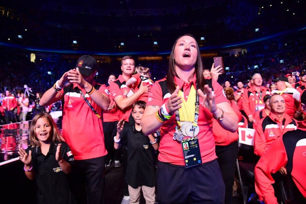 Natacha Dupuis of Canada cheers during the closing ceremony.