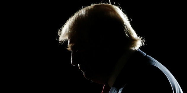 Republican presidential nominee Donald Trump speaks at an airport campaign rally in Albuquerque, New Mexico, U.S. October 30, 2016. REUTERS/Carlo Allegri