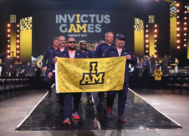 Competitors walk during the closing ceremony of the Invictus Games.