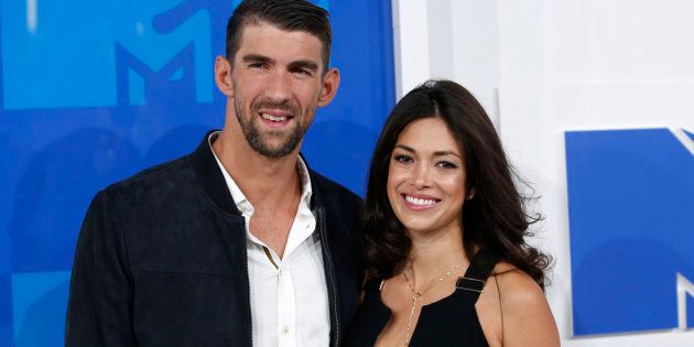 Olympic swimmer Michael Phelps and fiance Nicole Johnson arrive at the 2016 MTV Video Music Awards in New York, U.S., August 28, 2016. REUTERS/Eduardo Munoz