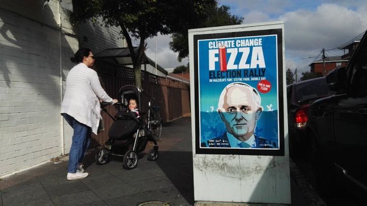 Fizza posters calling for a rally over climate change have popped up around the Wentworth electorate.