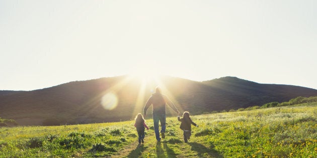 Father playing with his kids