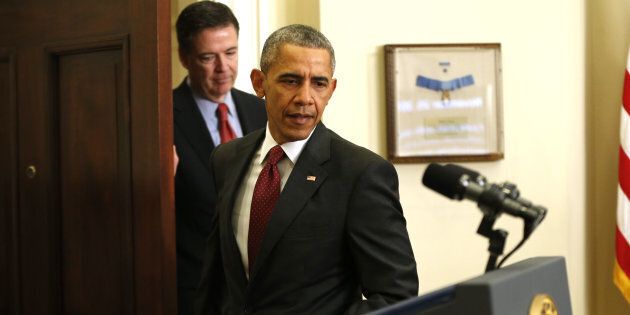 FILE - In this Nov, 25, 2015 fikle photo, President Barack Obama, followed by FBI Director James Comey, arrives in the Roosevelt Room of the White House in Washington for a briefing. Comey, who prides himself on moral rectitude and a squeaky-clean reputation is being criticized from all sides for lobbing a stink bomb into the center of the presidential race. Former Justice Department officials and former prosecutors from both parties have called the revelation an improper, astonishing and perplexing intrusion into politics in the critical endgame of the 2016 campaign. (AP Photo/Pablo Martinez Monsivais, File)