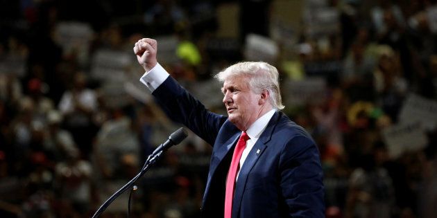 Republican U.S. Presidential candidate Donald Trump speaks at a campaign rally in Phoenix, Arizona, June 18, 2016. REUTERS/Nancy Wiechec