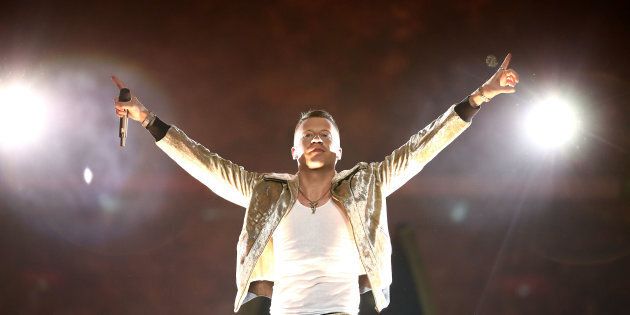 Macklemore performs before the 2017 NRL Grand Final match between the Melbourne Storm and the North Queensland Cowboys at ANZ Stadium on October 1, 2017 in Sydney, Australia.