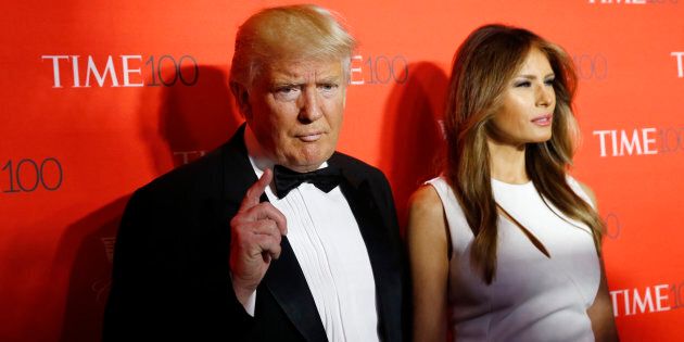 U.S. Republican presidential candidate Donald Trump and his wife Melania pose for photographers on the red carpet as they arrive for the TIME 100 Gala in Manhattan, New York, April 26, 2016. REUTERS/Shannon Stapleton