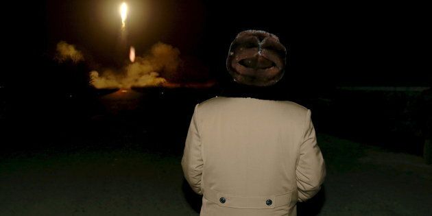 North Korean leader Kim Jong Un watches the ballistic rocket launch drill of the Strategic Force of the Korean People's Army (KPA) at an unknown location, in this undated file photo released by North Korea's Korean Central News Agency (KCNA) in Pyongyang on March 11, 2016. REUTERS/KCNA/Files ATTENTION EDITORS - THIS PICTURE WAS PROVIDED BY A THIRD PARTY. REUTERS IS UNABLE TO INDEPENDENTLY VERIFY THE AUTHENTICITY, CONTENT, LOCATION OR DATE OF THIS IMAGE. FOR EDITORIAL USE ONLY. NOT FOR SALE FOR MARKETING OR ADVERTISING CAMPAIGNS. NO THIRD PARTY SALES. NOT FOR USE BY REUTERS THIRD PARTY DISTRIBUTORS. SOUTH KOREA OUT. NO COMMERCIAL OR EDITORIAL SALES IN SOUTH KOREA. THIS PICTURE IS DISTRIBUTED EXACTLY AS RECEIVED BY REUTERS, AS A SERVICE TO CLIENTS. TPX IMAGES OF THE DAY TPX IMAGES OF THE DAY