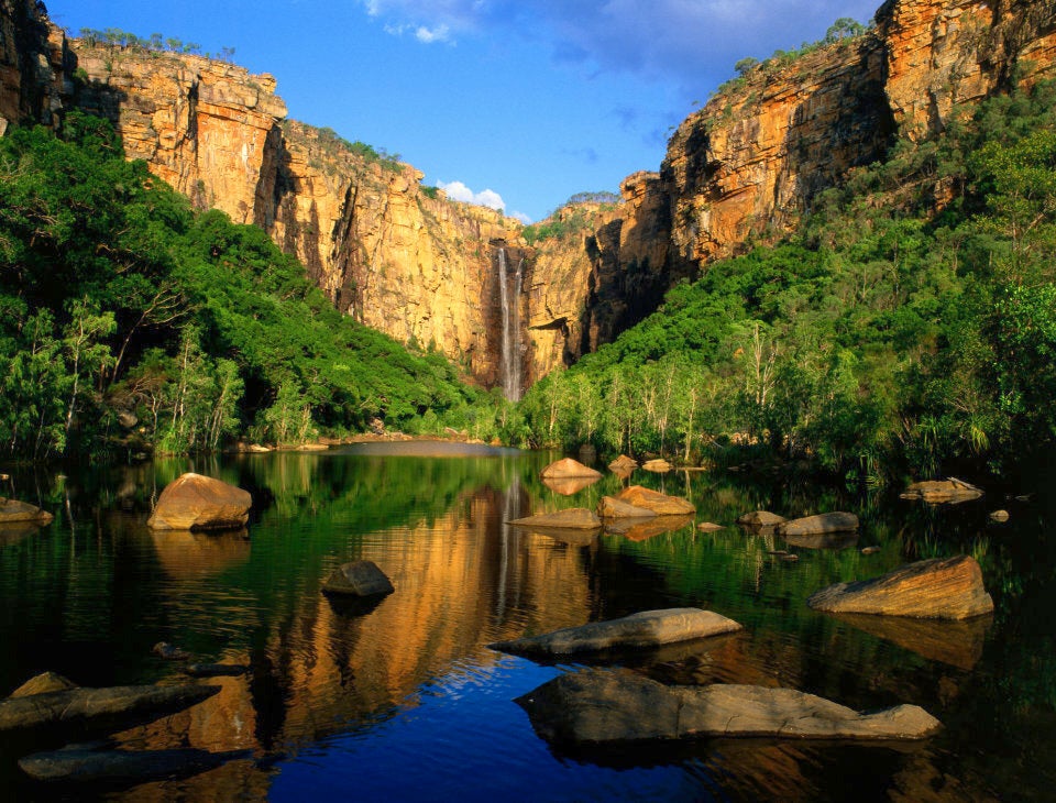 You can swim at Jim Jim Falls in Kakadu National Park but you might be joined by a freshwater crocodile.