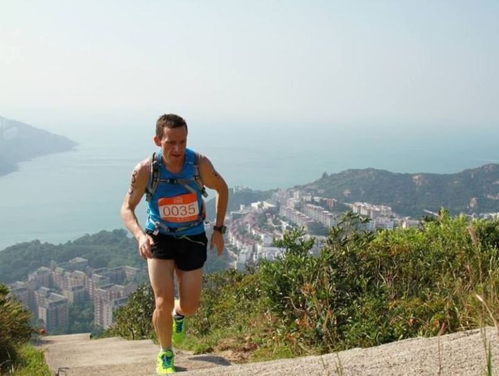 This is David competing in an 'aquathon' in his former home of Hong Kong -- an event combining road running, trail running and along distance swimming. Ouch, those hills.