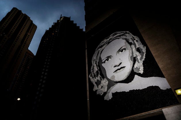 The mural by Noula Diamantopoulous was made of 20,000 jar lids -- representative of the 20,000 meals that the three companies hope to deliver to women in need.