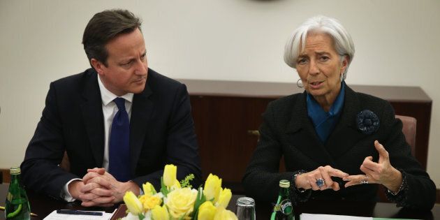 WASHINGTON, DC - JANUARY 15: International Monetary Fund Managing Director Christine Lagarde (R) speaks as British Prime Minister David Cameron (L) listens during a meeting at the IMF headquarters January 15, 2015 in Washington, DC. Prime Minister Cameron is on a two-day visit to Washington. (Photo by Alex Wong/Getty Images)
