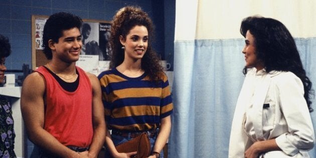 SAVED BY THE BELL -- 'From Nurse to Worse' Episode 16 -- Air Date 12/15/1990 -- Pictured: (l-r) Mario Lopez as A.C. Slater, Elizabeth Berkley as Jessie Spano, Nancy Valen as Jennifer -- Photo by: Gary Null/NBCU Photo Bank