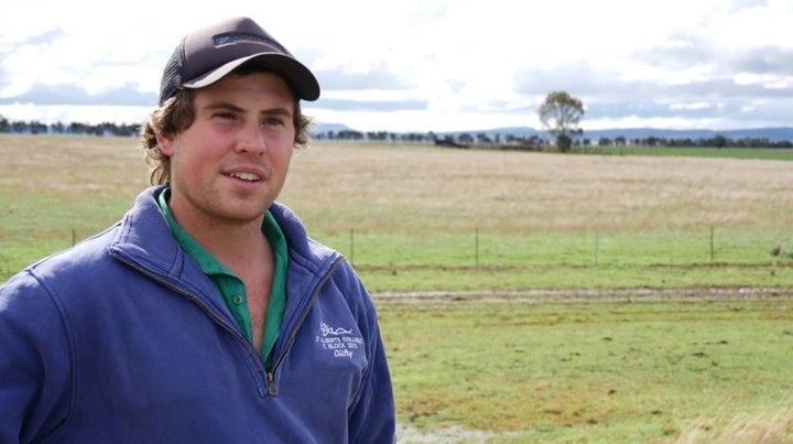 James Clift on his 200 acre property -- the ridge behind the 23 year old farmer is where the proposed coal mine pit as part of Shenua Watermark coal mine might be built by 2040, and part of the 10,000 acre Clift family farm falls within the mine's buffer zone.