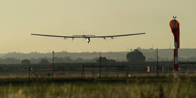 The sun-powered Solar Impulse 2 aircraft lands at Sevilla airport on June 23, 2016, after a 70-hour journey from New York powered only by sunlight.The sun-powered Solar Impulse 2 aircraft set off from New York's JFK airport early June 20, embarking on the transatlantic leg of its record-breaking flight around the world to promote renewable energy. The round-the-world solar flight is estimated to take some 500 flight hours and cover 35,000 km with Swiss founders and pilots, Bertrand Piccard and Andre Borschberg landing every few days to switch between piloting and hosting public events. / AFP / CRISTINA QUICLER (Photo credit should read CRISTINA QUICLER/AFP/Getty Images)