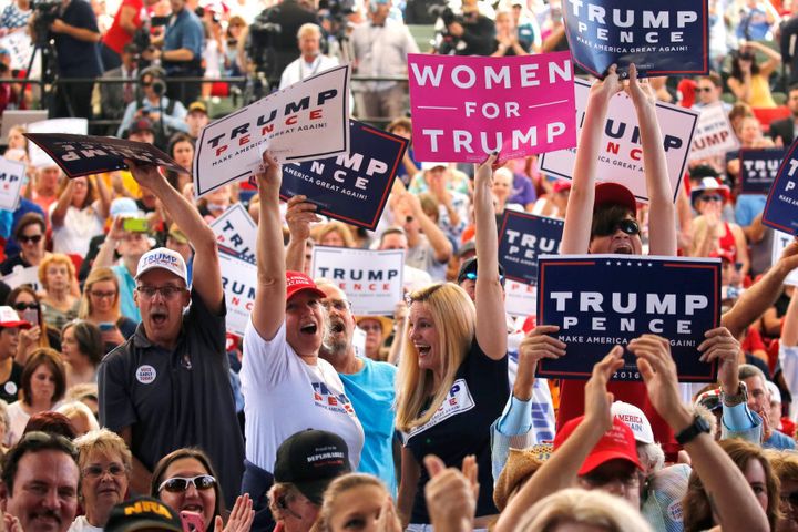 Supporters of Republican U.S. presidential nominee Donald Trump attend a rally in St. Augustine, Florida, U.S. October 24, 2016. REUTERS/Jonathan Ernst/File Photo