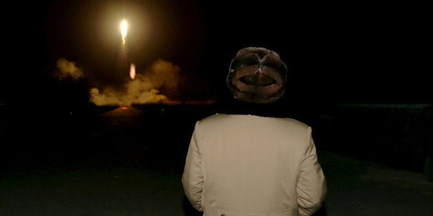 FILE PHOTO: North Korean leader Kim Jong Un watches the ballistic rocket launch drill of the Strategic Force of the Korean People's Army (KPA) at an unknown location, in this undated file photo released by North Korea's Korean Central News Agency (KCNA) in Pyongyang on March 11, 2016. KCNA/ via REUTERS/File PhotoATTENTION EDITORS - THIS PICTURE WAS PROVIDED BY A THIRD PARTY. REUTERS IS UNABLE TO INDEPENDENTLY VERIFY THE AUTHENTICITY, CONTENT, LOCATION OR DATE OF THIS IMAGE. FOR EDITORIAL USE ONLY. NOT FOR SALE FOR MARKETING OR ADVERTISING CAMPAIGNS. NO THIRD PARTY SALES. NOT FOR USE BY REUTERS THIRD PARTY DISTRIBUTORS. SOUTH KOREA OUT. NO COMMERCIAL OR EDITORIAL SALES IN SOUTH KOREA. THIS PICTURE IS DISTRIBUTED EXACTLY AS RECEIVED BY REUTERS, AS A SERVICE TO CLIENTS.