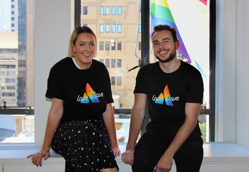 Atlassian staff donning their 'Love is Love' t-shirts.