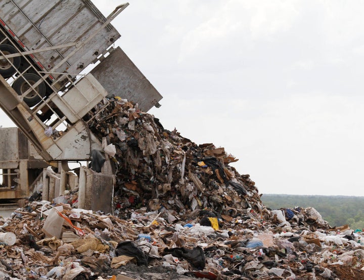 A tipper dumps a load of trash at the Shoosmith Landfill in Chesterfield, Virginia, U.S.A.