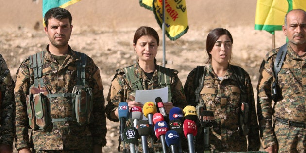 Syrian Democratic Forces (SDF) commanders attend a news conference in Ain Issa, Raqqa Governorate, Syria November 6, 2016.