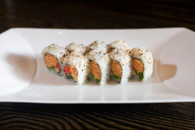Yellowtail's popping spicy crab sushi