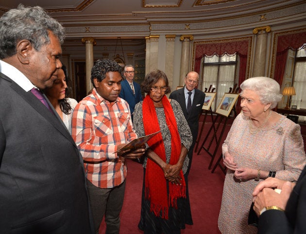 Queen Elizabeth II and the Duke of Edinburgh talk with Kevin Namajtira (left) the grandson and Lenie Namatjira (centre) the granddaughter of Albert Namajtira.