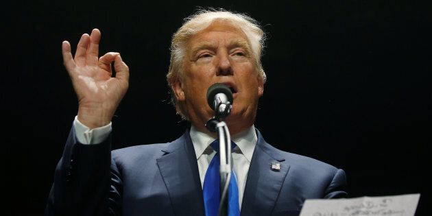 Republican presidential nominee Donald Trump attends a campaign rally in Manchester, New Hampshire, U.S. November 7, 2016. REUTERS/Carlo Allegri