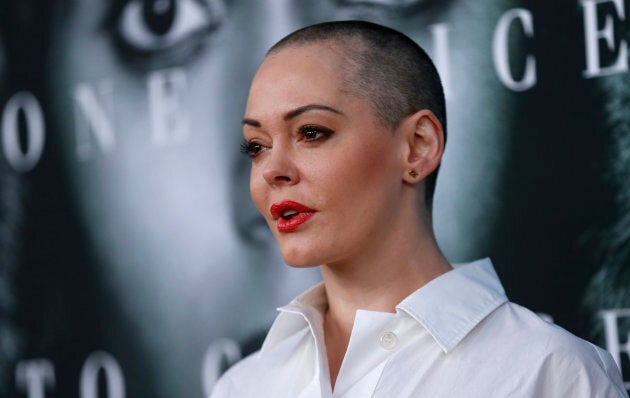 Actress Rose McGowan poses at the premiere for the television movie "Confirmation" in Los Angeles, California March 31, 2016.