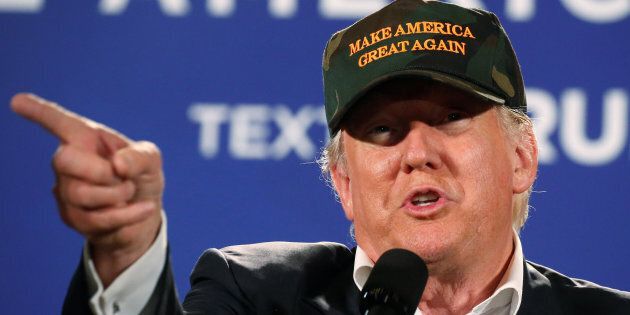 Republican presidential nominee Donald Trump holds a campaign event in Pensecola, Florida U.S. November 2, 2016. REUTERS/Carlo Allegri