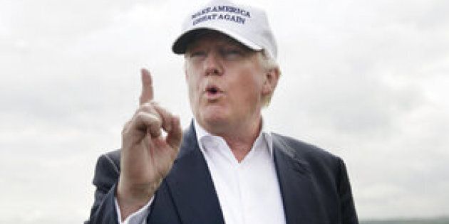 Donald Trump, presumptive Republican presidential nominee, gestures as he speaks to members of the media at Trump International Golf Links in Aberdeen, U.K, on Saturday, June 25, 2016. The grand re-opening of the golf course went on as scheduled as financial markets rattled into a panicked state of uncertainty following the EU referendum result. Photographer: Matthew Lloyd/Bloomberg via Getty Images