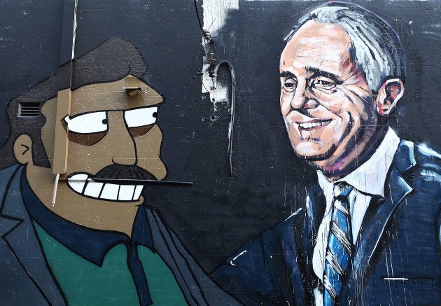 This Sydney mural depicts Prime Minister Malcolm and Simpsons character 'Fat Tony', who just happens also to look a little like Gautam Adani.