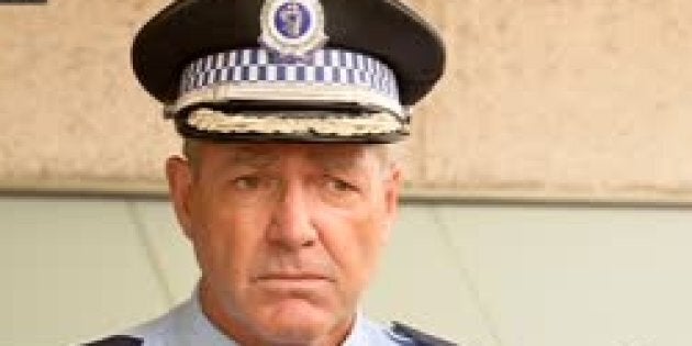 Assistant Commissioner Max Mitchell addresses reporters on Wednesday