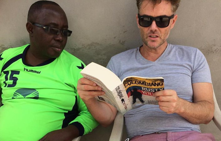 Rusty Young reading some of his book Colombiano to his former San Pedro prison friend Thomas McFadden. The two men are still incredibly close friends; McFadden named his first born son after Rusty.