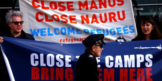 Refugee advocates protest against the detention of asylum seekers being held at Australian-run offshore detention centers on Manus Island and Nauru.