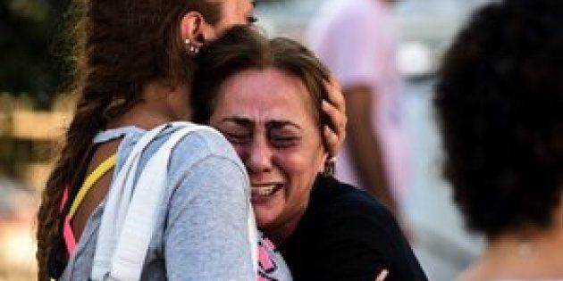 A woman cries outside a forensic medicine building close to Istanbul Ataturk Airport on June 29, a day after a triple suicide bombing killed at least 41 people.