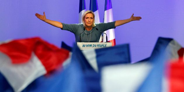 Marine Le Pen, French National Front (FN) political party leader, gestures during an FN political rally in Frejus, France, September 18, 2016.